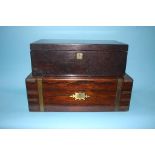 A 19th century rosewood writing box, with brass banding and an oak writing slope