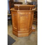 A Robert 'Mouseman' Thompson oak pulpit of panelled form with integral steps, bookshelf, seat and