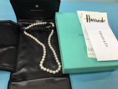 A Tiffany and Co pearl necklace with 18ct gold clasp (purchased from Harrods in 2008)