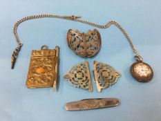 An aide memoire, Continental pocket watch, buckles etc.