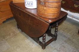 An oak barley twist gateleg table