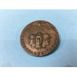 A Reichsparteitag 1935 Nuremberg Rally badge, stamped Laver Nurnberg 1790 to rear