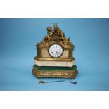A French clock group by Henry Marc of Paris, with enamelled dial and 8 day movement