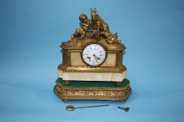A French clock group by Henry Marc of Paris, with enamelled dial and 8 day movement