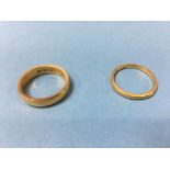 Two 22ct gold rings, 10g