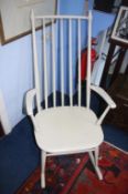 Cream painted spindle back rocking chair