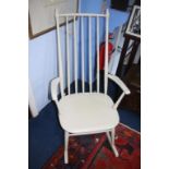 Cream painted spindle back rocking chair