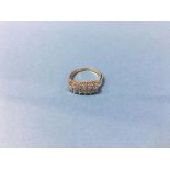 An 18ct gold ring, mounted with 12 0.05ct old cut diamonds, size 'T', 4.1g