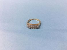 An 18ct gold ring, mounted with 12 0.05ct old cut diamonds, size 'T', 4.1g