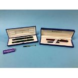 A Waterman fountain pen with 18ct nib and a boxed Waterman fountain pen and ball point pen set