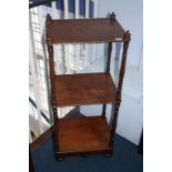 A mahogany three tier what not, with single drawer