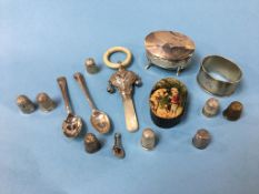 A snuff box, various silver thimbles, teething ring, etc.
