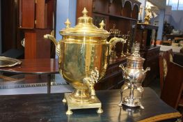 A large brass Samovar and a silver plated Samovar