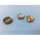 A 15ct Ct. opal ring, 1.8g and an 18ct opal ring, 4.2g and a 9ct ring, 4.7g (3)