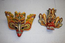 Collection of four Eastern masks