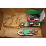 Various model boats and trucks