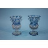 Two blue flashed and hobnail cut goblets