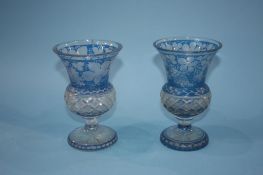 Two blue flashed and hobnail cut goblets