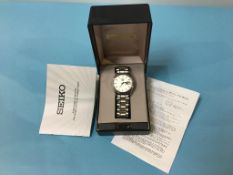 A gents stainless steel wristwatch, dial signed Seiko Automatic, with box and paperwork