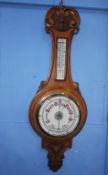 An oak cased Banjo barometer