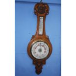 An oak cased Banjo barometer