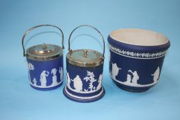 Two Jasperware biscuit barrels and a jardinière