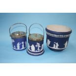 Two Jasperware biscuit barrels and a jardinière