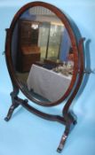 A mahogany dressing table mirror