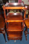 A 19th century mahogany three tier what not, with single drawer