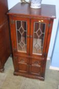 An Old Charm oak cabinet