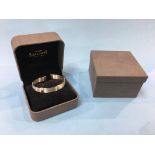 A David Morris ‘Afrika’ 18ct gold bangle, stamped 750, weight 14.9 gram (boxed)