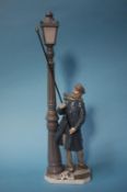 A Lladro Lamplighter figure