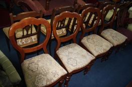 A set of four Victorian mahogany dining chairs