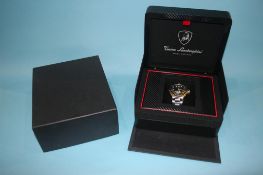 A gents watch, the dial signed Lamborghini, with box and paperwork