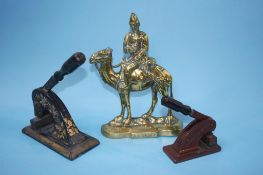 A Victorian brass 'Wolseley' door stop and two address stamps