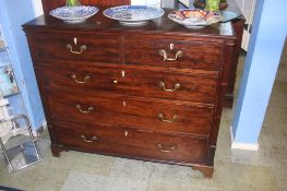 A 19th century oak chest of drawers, with two short and three long graduated drawers