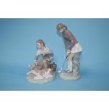 A Lladro group of a girl with a calf and a Lladro golfer (2)