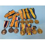 A collection of eleven World War One medals, comprising War medals and eight Victory medals, to 11