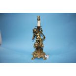 A gilt metal Cherub table lamp