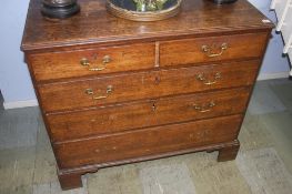 A 19th century oak chest of drawers, with two short and three long graduated drawers