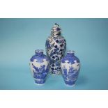 A pair of Chinese blue and white vases, decorated with figures, 17.5cm height and a tall blue and