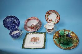 A jumbo tea cup and saucer, two moustache cups, three leaf plates etc.