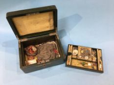 A leather jewellery box and contents, including coral necklace etc.