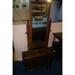 Oak cheval mirror and mahogany Sutherland table