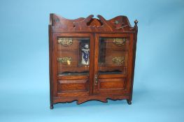 An oak tobacco cabinet