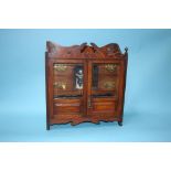 An oak tobacco cabinet