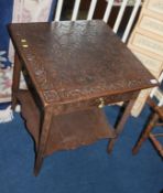 Carved oak two tier side table, with single drawer