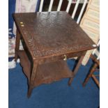 Carved oak two tier side table, with single drawer