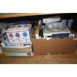 Shelf of assorted books and DVDs