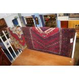 A Persian design rug and a woollen rug